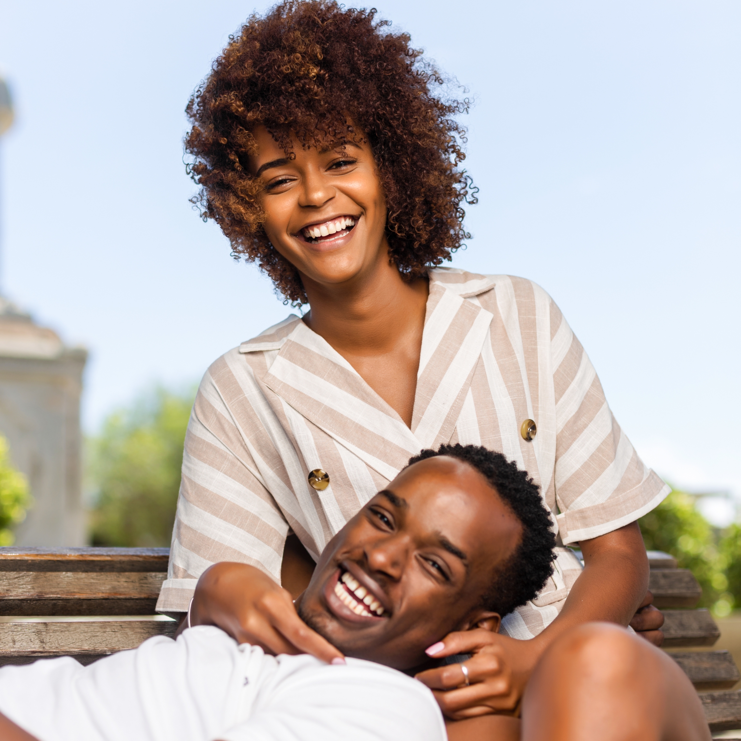 Outdoor protrait of black african american couple embracing each other